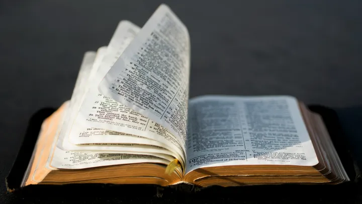 bible flipping through pages