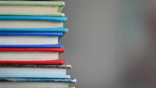 stack of books on table